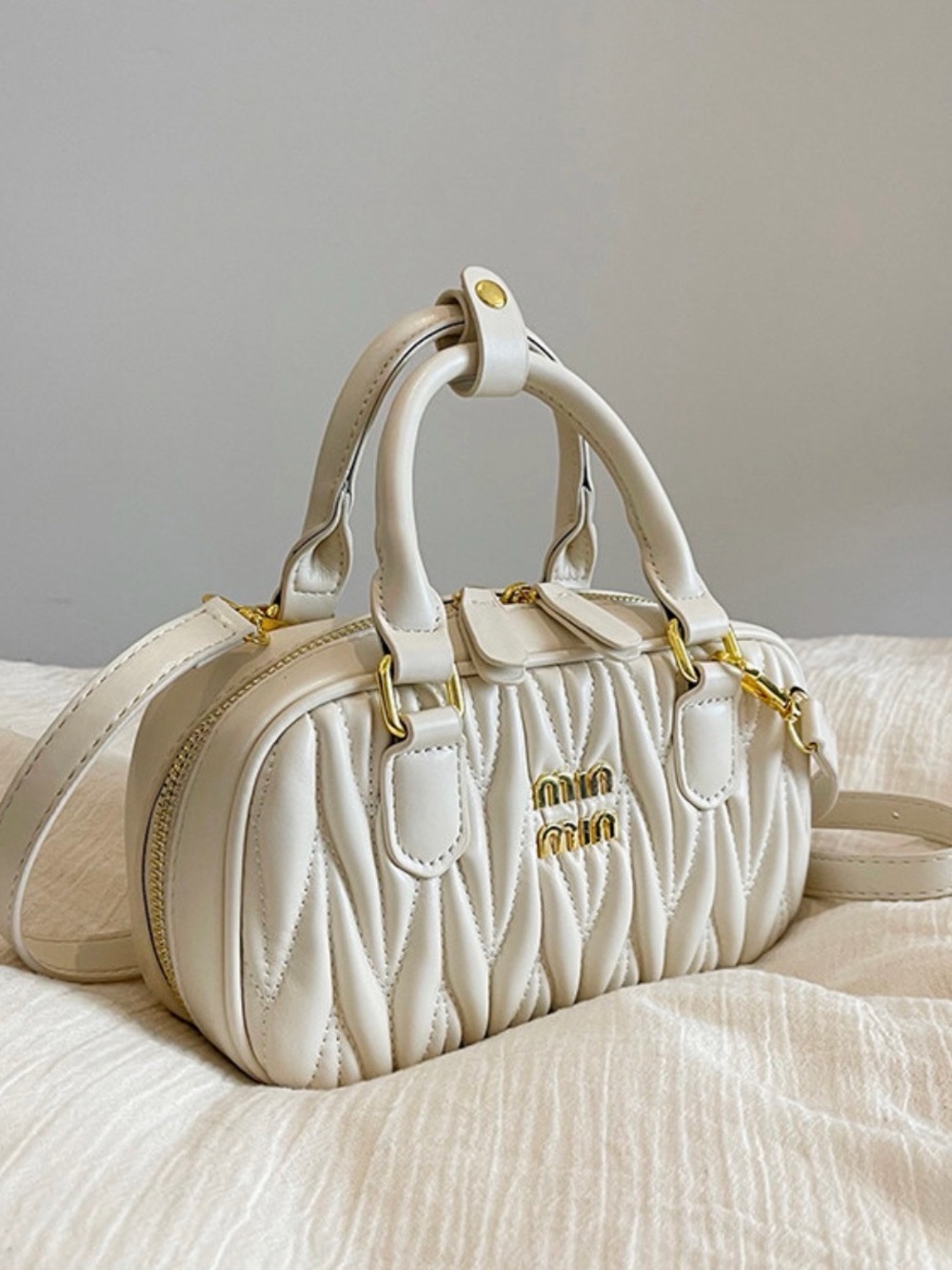 A Classy Chic Boutique Cream Quilted Oval Satchel